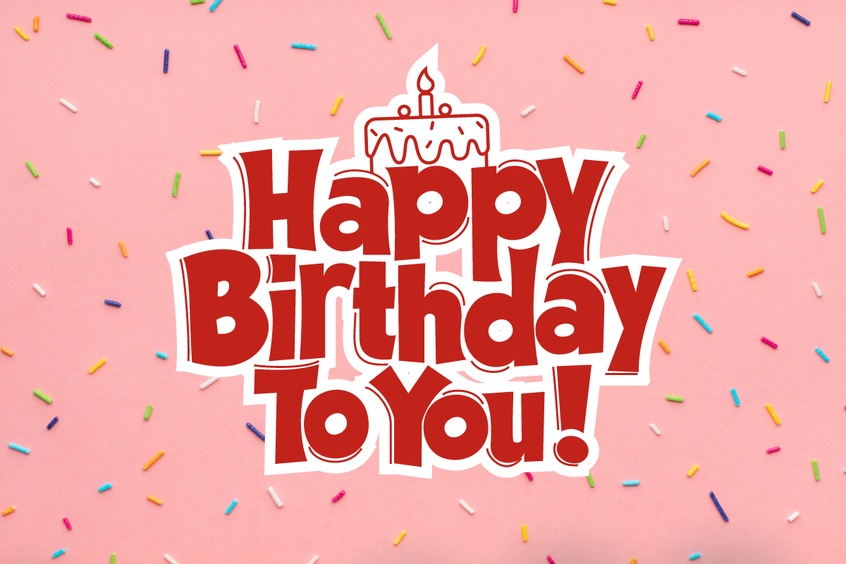 a sign with flowers and Happy Birthday text